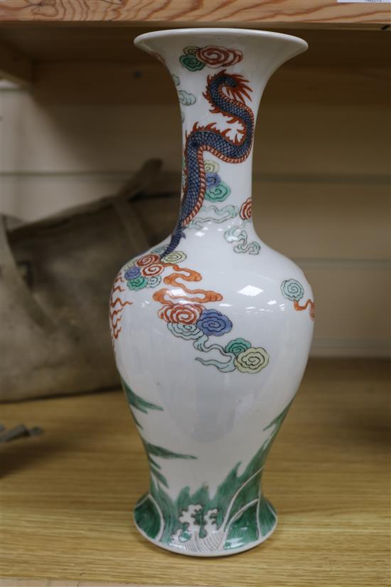 A Chinese famille verte vase decorated with a dragon, late 19th century H 30cm